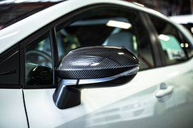 TOM'S RACING CARBON MIRROR COVERS - GR COROLLA [2023+]
