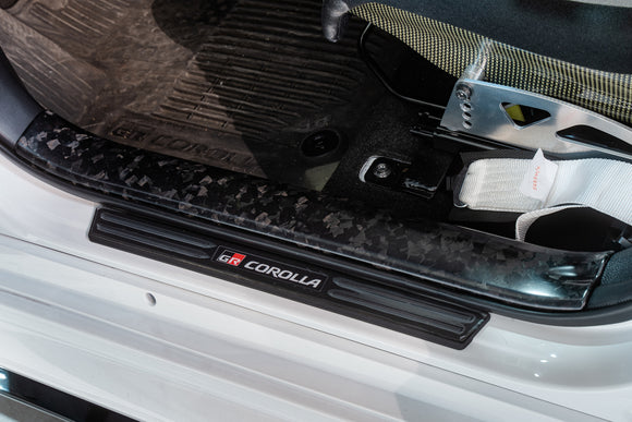 TOM'S RACING FORGED CARBON FRONT SCUFF PLATE COVER - GR COROLLA [2023+]