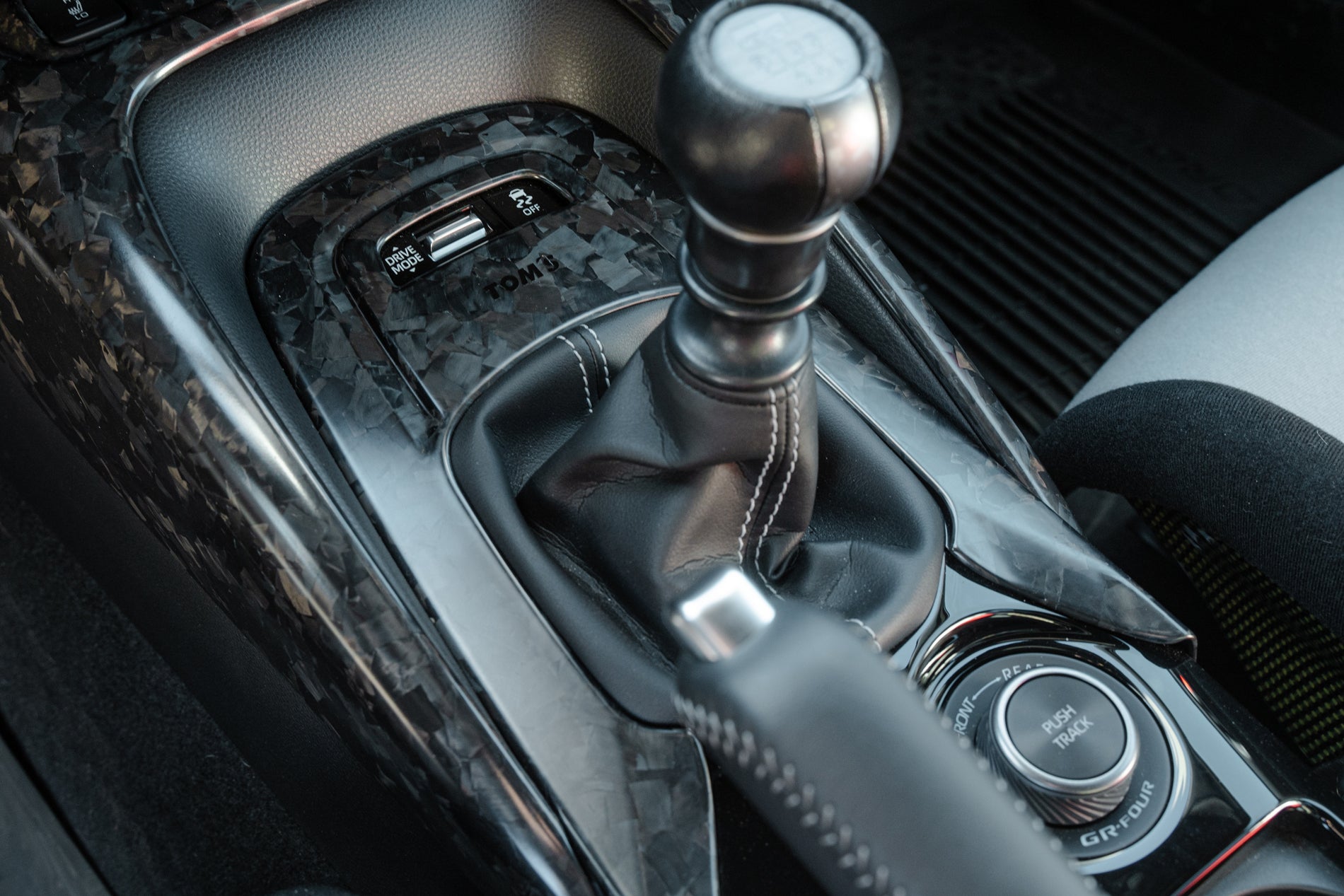 TOM'S RACING FORGED CARBON SHIFT PANEL NO.01 - Corolla Hatchback [2019+]